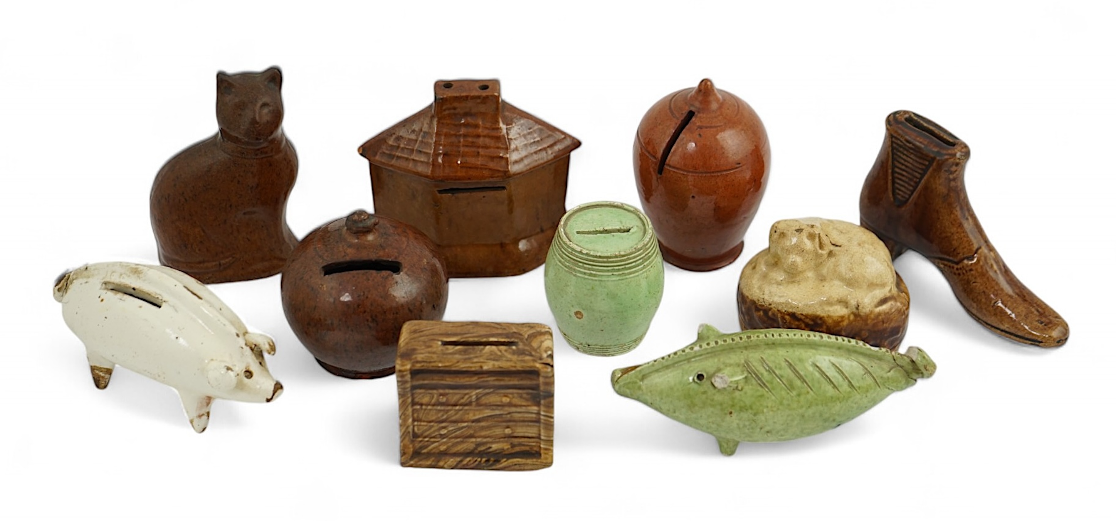 A collection of ten 19th century Dutch and British pottery money boxes